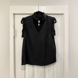 Sleeveless Top with Ruffle Neck and V Cut Out